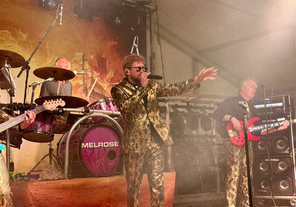 People enjoying music, guitar and drum